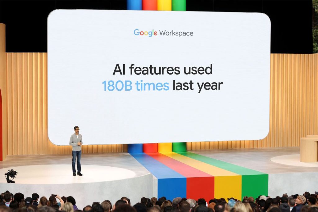 Google Stage with announcement that AI that Google AI was used 180 billion times in one year.